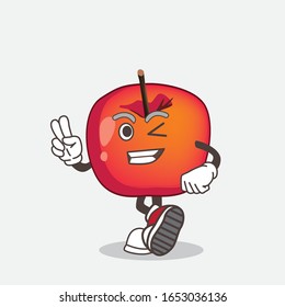 Crab Apple cartoon mascot character with two fingers