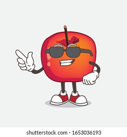 Crab Apple cartoon mascot character wearing black glasses