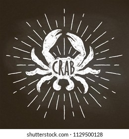 Crab chalk silhoutte with sun rays on blackboard. Good for seafood  restaurant menu design, decor, logotypes,  or posters.