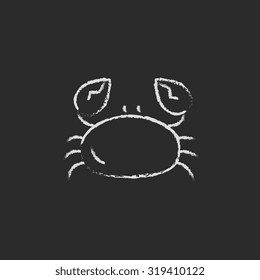 Crab hand drawn in chalk on a blackboard vector white icon isolated on a black background.