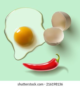 cracked raw egg, shell, yolk and red pepper