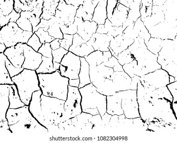 The cracks texture of dry earth. Grunge abstract background. Distressed vector overlay.