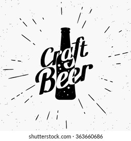 Craft beer black and white label of bottle with lettering and starburst in hipster style isolated on grunge background. Template for poster or oktoberfest party