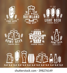 Craft beer brewery emblems, labels and design elements. White print on blurred background