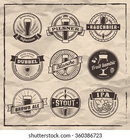 Craft beer labels. Traditional german, belgian and british beer styles. Weissbier, pilsner, rauchbier, dubbel, blanche, fruit lambic, brown ale, stout and IPA. Vintage emblems on a paper background.