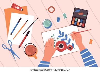 Craft hobby flat background with human hands watercolour painting with brushes scissors and paints on table top view vector illustration