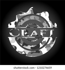 Craft on grey camouflaged texture