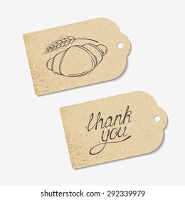 Craft paper tags with THANK YOU hand lettering and sketched croissant. Design for cafe, coffee shop, bakery. Vector illustration - eps 8