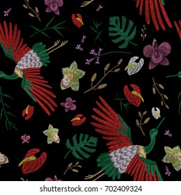 Crane and flowers plant. Traditional folk stylish stylish floral embroidery on the black background. Sketch for printing on fabric, clothing, bag, accessories and design. Vector, trend