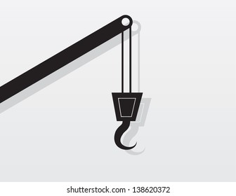 Crane silhouette in front of gray background 