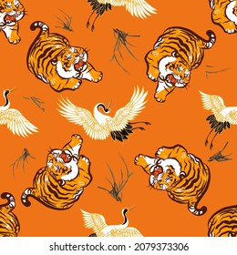 CRANES TIGER AND COLOR SAKURA.Colorful floral seamless pattern with flowers, japanese bird. Vector traditional folk fashion ornament on  
Orange background.