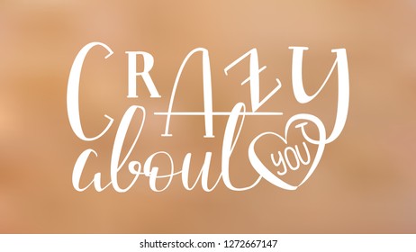 Crazy About You - White Hand Drawn Lettering on Blur Background. Vector Illustration Quote. Handwritten Inscription Phrase for Valentine Day Greeting Card Design, Celebration.
