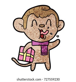 loco mono de caricatura con regalo de navidad