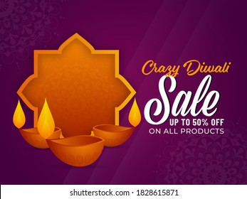 Crazy Diwali Sale Poster Design with 50% Discount Offer, Empty Vintage Frame and Lit Oil Lamps (Diya) on Dark Magenta Mandala Pattern Background.
