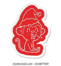 crazy quirky cartoon  sticker of a monkey sitting wearing santa hat