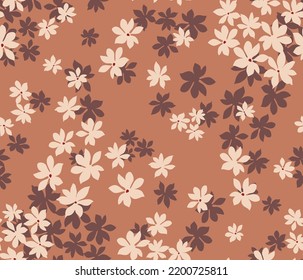 cream and brown seamless floral vector small flowers pattern on orange background