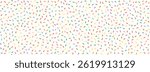 Cream donut sprinkles seamless pattern. Colorful sugar candy background. Cake glaze icing overlay for decorative banner, poster, template. Cupcake or ice cream topping texture. Vector wallpaper