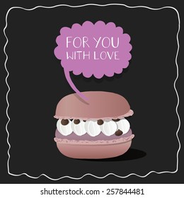 Cream filled macaroon illustrations on chalkboard with speech bubble.