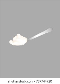 Cream on a spoon isolated