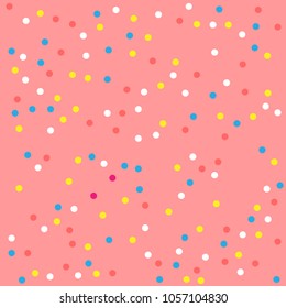 Cream texture with sprinkle topping of colorful beads on pink background. Food bakery decoration. 