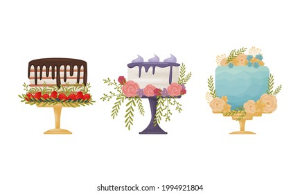 Creamy Tier Cake Decorated with Flowers and Berries Standing on Pedestal Cake Plate Vector Set
