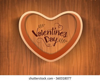 Creative 3D heart on wooden background for Happy Valentine's Day celebration.
