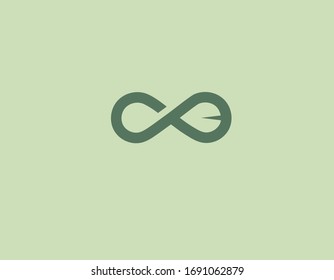 Creative abstract green logo icon infinity sign with plant leaf inside for your company