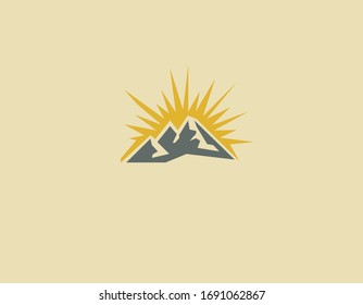 Creative abstract logo mountain icon with sun and rays for your company