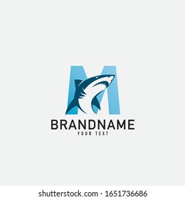 Creative abstract logo sign letter M and shark fin silhouette typography for company