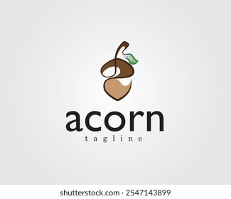 creative acorn with leaves on it logo design