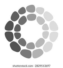 Creative arrangement of smooth gray stones forming a circle and winding paths. Minimalist pebble design suitable for spa, yoga, meditation, and wellness concepts.