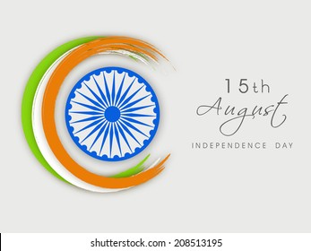 Creative background for 15th of August, Indian Independence Day celebrations with Asoka Wheel and Indian tricolors stripe on grey background.