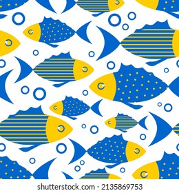 Creative blue and yellow fish on a white background. Cute nautical seamless pattern for textile and paper products. Vector.
