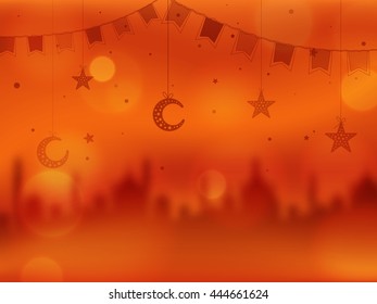 Creative Blurred Mosque with Hanging Crescent Moons, Stars and Buntings decoration, Beautiful Islamic Background, Elegant Greeting Card design for Muslim Community Festivals celebration.