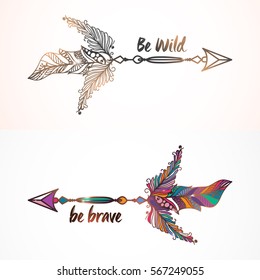 Creative Boho style ethnic Arrows with Feathers on shiny background.