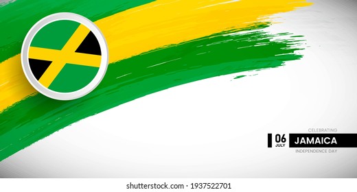 Un pincel creativo con la bandera del país de Jamaica. Feliz Día de la Independencia con una bandera gruesa