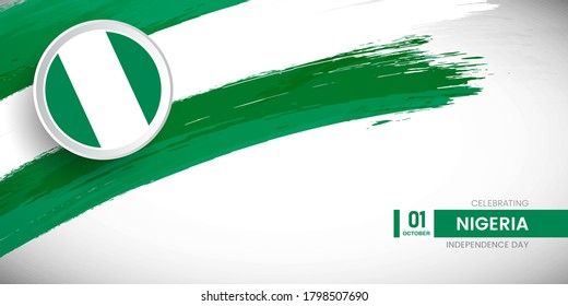 Un pincel creativo con la bandera del país nigeriano. Feliz Día de la Independencia con una bandera gruesa