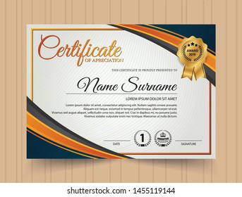 creative certificate of appreciation award template with blue and orange shapes and badge 
