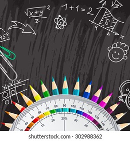 Creative chalkboard school background with pencils and protractor