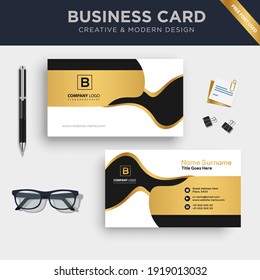 Creative and Clean Double-sided Business Card Template with Flat Wave Design Vector Illustration.