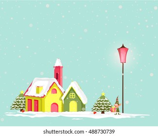 Creative colorful houses on winter background for Merry Christmas celebration.
