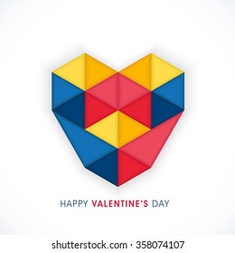 Creative colorful origami heart on white background for Happy Valentine's Day celebration.