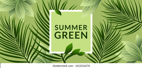 Creative composition with tropical plants. Fresh summer greens for decoration.