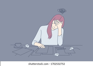 Creative crisis, fatigue, mental stress, depression, frustration concept. Young depressed frustrated upset woman or girl, writer artist has creative crisis. Fatigue, raising of mental stress, headache