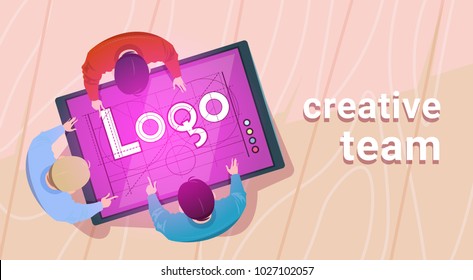 Creative Designers Team Working Sit At Desk Together Create Web Logo On Digital Tablet In Modern Office Top Angle View Flat Vector Illustration