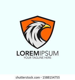 Creative eagle head logo. Flat style falcon design on Shield background
