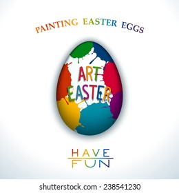 Creative Easter design with colored egg in the paint spots