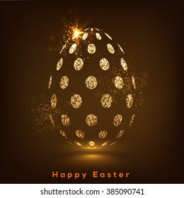 Creative Easter Egg made by golden glittering dots on shiny brown background.