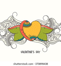 Creative floral design decorated greeting card with colorful heart for Happy Valentine's Day celebration.