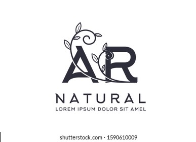Creative floral wedding initial AR icon design. Vector logo template